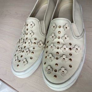 White leather coach slip on sneakers with flowers